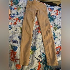 No boundaries tan skinny jeans